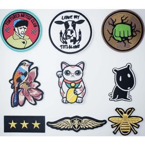 Beckoning Cat Hulk Press clothes stitch sew seam cloth textile ornament adornment decoration garnish of overcoat pants backpack