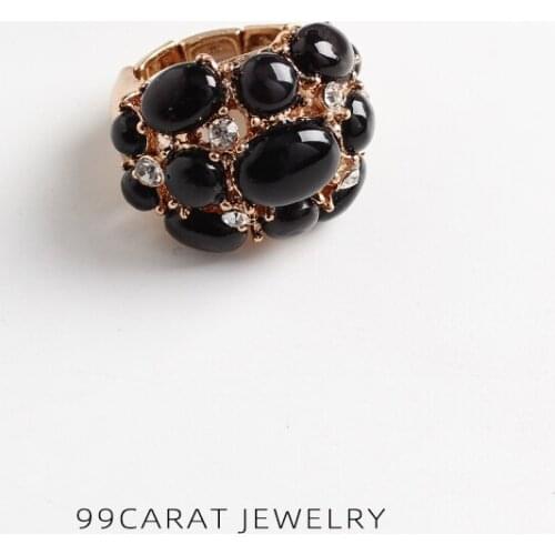 Nine nine carat European and American fashion jewelry brand texture black flash diamond elastic gold ring exaggerated punk (KF