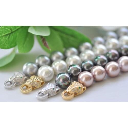 P7146 8" 14mm Round South Sea Shell Pearl Bracelet CZ