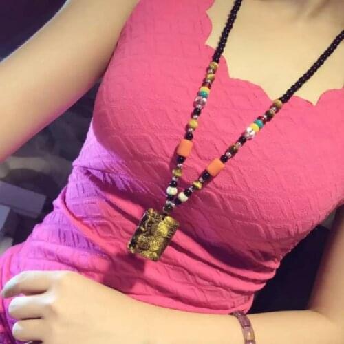 Yellow tights eye stone necklace tigers down the mountain tiger pendants for money transfer sweater chain long female