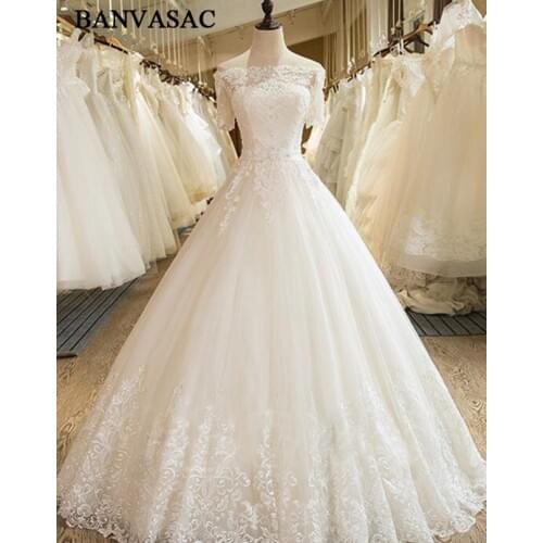 BANVASAC 2017 New Elegant Embroidery Boat Neck Wedding Dresses Half Sleeve Satin Lace Backless Bridal Ball Gowns
