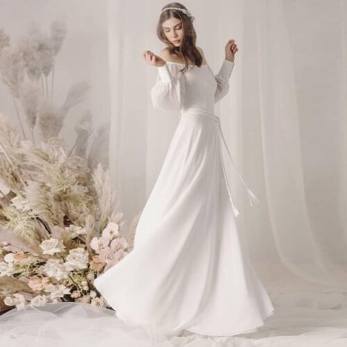 Charming A-Line Off the Shoulder Wedding Dress 2021 Sexy Boat Neck Floor Length Zipper Back White Bridal Gowns with Sahses