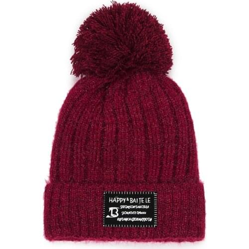 Autumn and winter hair ball student ear protection Korean version of knitted ladies hat Womens winter thick warm wild wool hat