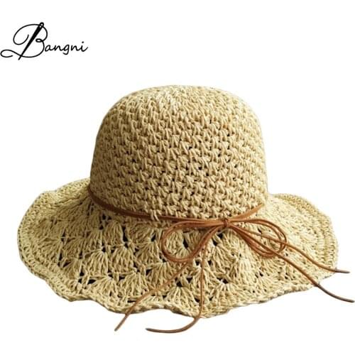 New arrival elegant wide brim floppy elegant summer sun hats for Women summer straw flat khaki hollow natural straw Bow belt cap