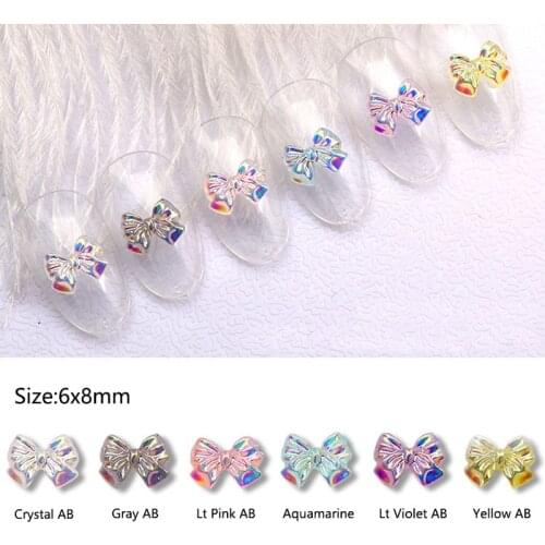30/100Pcs Aurora AB 6x8mm Resin Bow knot Nail Art Decorations Rhinestones DIY Glitter Manicure Design Accessories