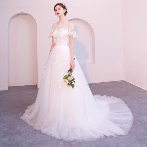 Elegant Tulle Wedding Dresses 2019 Sexy beading caps Appliques Princess Bridal ball Gown Vestido de Noiva