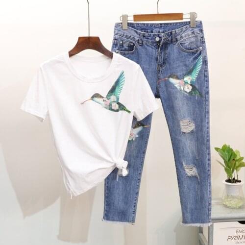 2021 Summer New Nail Drill Bird Short-sleeved T-shirt + Hole Seven-point Jeans Suit Womens Trend In Europe and America 2pcs Set