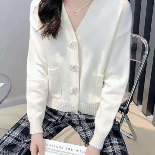 Autumn and winter clothing 2021 new bow-knot button loose V-neck Western style long-sleeved knitted cardigan sweater women