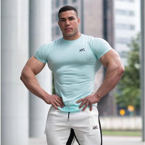 Brand Men T shirt bodybuilding fitness mens tops cotton leisure gyms singlets Cotton Short Sleeve tight fashion Tshirt Tops