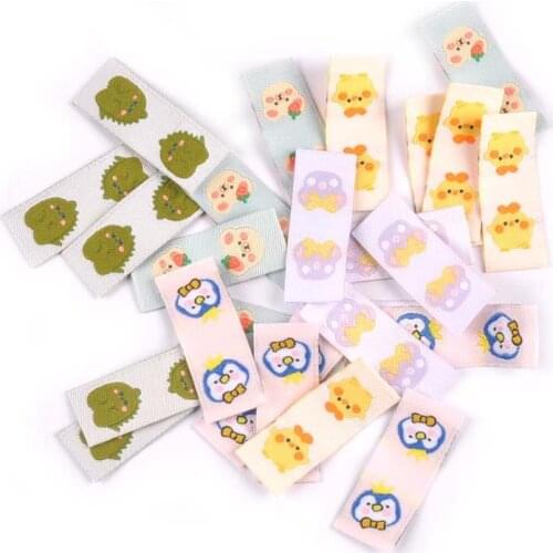 50Pcs Cartoon Dinosaur/Penguin Labels For Shoes Care Bags Sewing Garment Handmade Accessories DIY Crafts Fabric Clothing Tags
