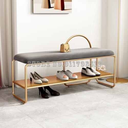 Simple shoe changing stool. Home entrance shoe cabinet. Light luxury clothing store. Shoe stool. Enter the door. The bench can s