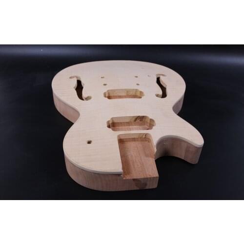 One left hand unfinished guitar body mahogany made and maple top 1