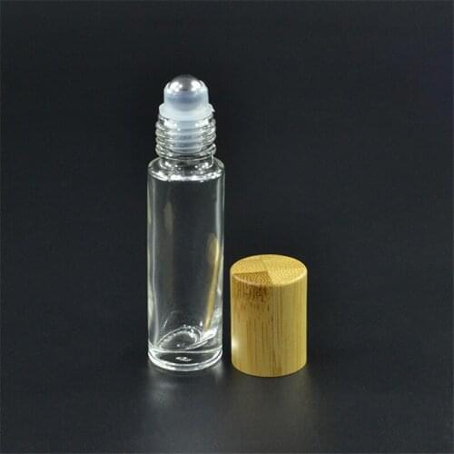 1000pcs*10ml clear roll on bottles with bamboo cap ,stainless stell ball for perfume sample or travel perfume bottles