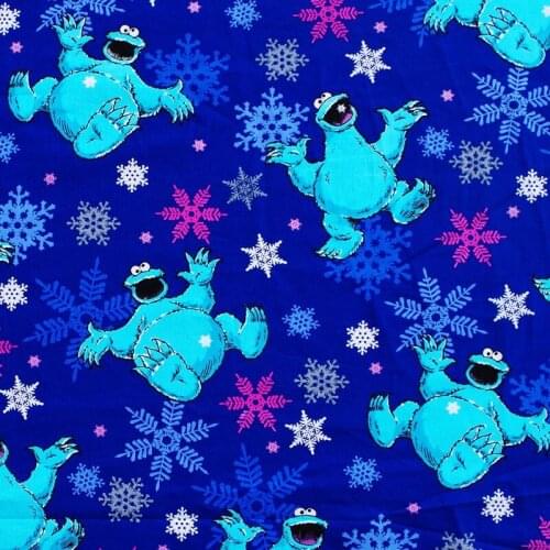 Cotton Woven Fabric - Dinosaur and snowflower (navy-blue)