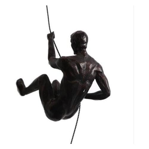 A modern Home American retro sculpture climbing character wall ofing TV wall hanging modern household decoration