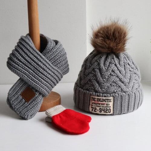 A three-piece autumn/winter childrens sweater cap for boys and girls muffler gloves for babies with a thick warm jumper knitted