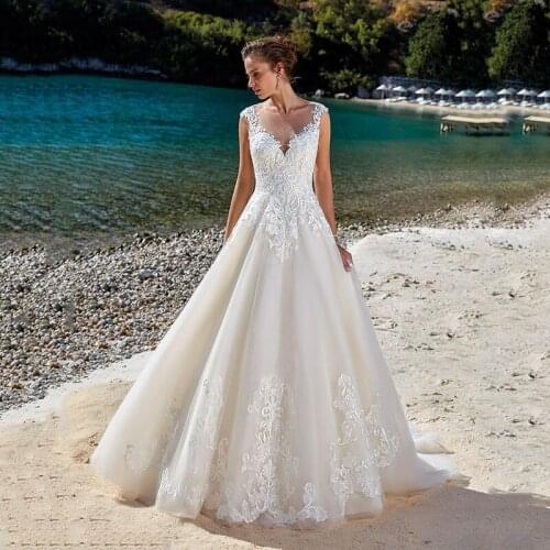 Sumnus Boho Wedding Dresses 2020 V Neck Lace Applique Illusion Back Beach Bridal Gown Princess Wedding Dresses vestidos de novia