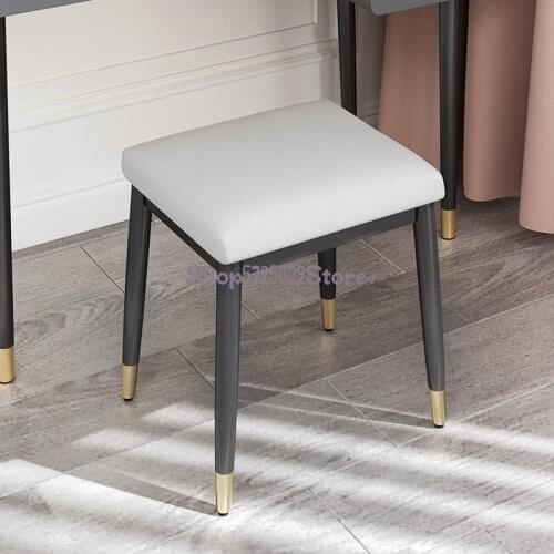 Light luxury makeup stool modern minimalist dressing stool Nordic home bedroom dressing table chair net red leather low stool