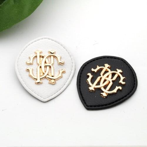 20pcs/lot black/white PU leather sew on patches Fashion labels with metal logo clothing label for jeans/jacket PLB-001