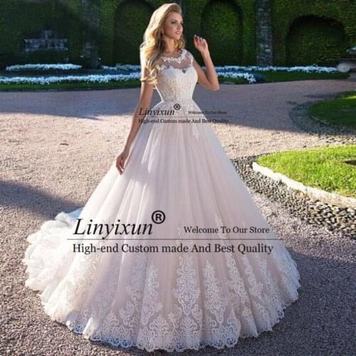 Romantic Scoop Neck Lace Up A-Line Wedding Dresses 2021 Gorgeous Cap Sleeves Appliques Court Train Princess Wedding Gown