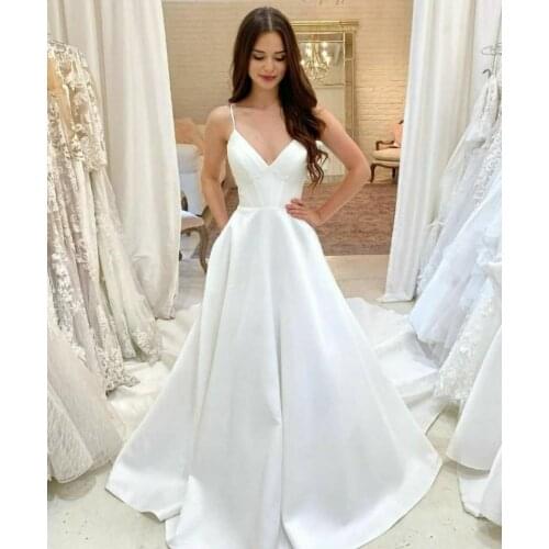 Sexy White A-Line Long V-Neck Satin Wedding Dresses with Pockets Floor Length Pleated Open Back Spaghetti Bridal Gowns for Women