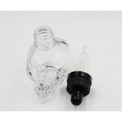 100pcs 30ml skull glass dropper bottle with child proof cap skull dropper bottle clear glass material bottle wholesale S033B