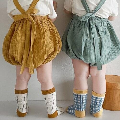 2021 Japan and Korea summer new childrens strappy pants European and American new childrens shorts with hat