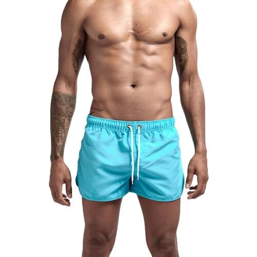 Men Fashion Beach Shorts Polyester Quick-drying Solid Color Breathable Sports Shorts 2021 Summer Swimming Surfing Beach Shorts