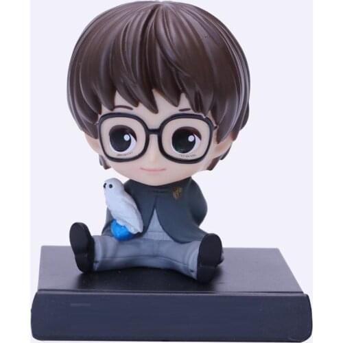 Q version of the magic academy Harried car decoration creativity shook his head doll ornaments birthday New Year Goods Gift