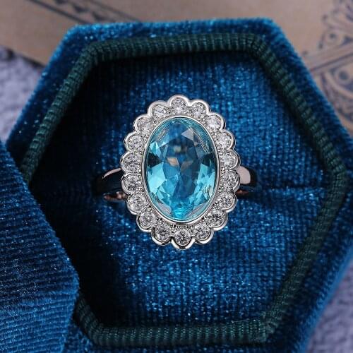 The New Color Separation Ring Two-color Inlaid Sea Blue Oval Zircon Ring European and American Womens Prom Gift Jewelry