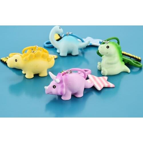 Creative soft rubber cartoon Triceratops Tyrannosaurus key chain dinosaur pendant car key chain accessories gifts