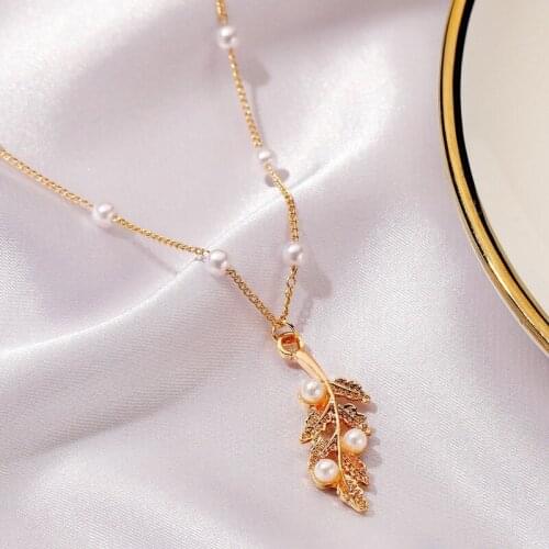 U-Magical Exquisite Shining Pearl Leaf Pendant Necklace for Women Temperament Metallic Beaded Necklace Party Jewelry Accessories
