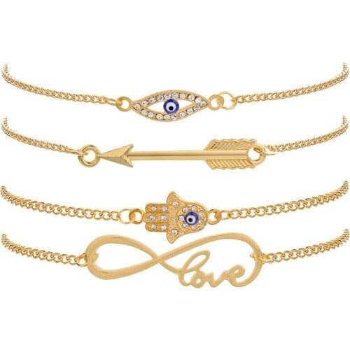 Pack Of 4 personality bangle bracelet with inlay rhinestone eye /palm and arrow /digit 8 design in burnished in gold tone