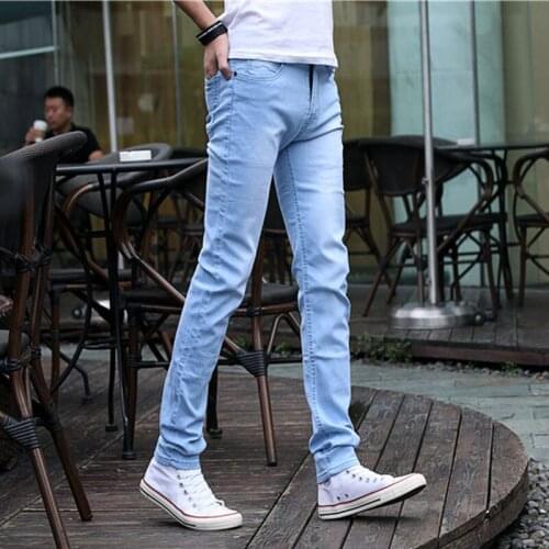 Wholesale 2020 thin mens handsome jeans trendy Korean style slim-fitting small-footed casual trousers youth student mens pants