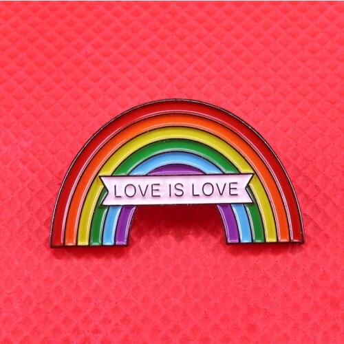 Sweet Little Rainbow Pin Of all the gay slogans out there- Love is Love is our personal favorite