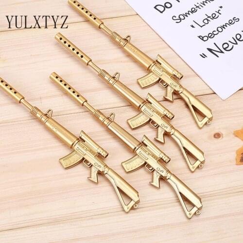 2pcs/lot Toy Gun Shape Gel Pen Novelty 0.38mm Golden Plastic Writing Pen Black Ink Rifle Pen for Kids Game Toy Korean Stationery