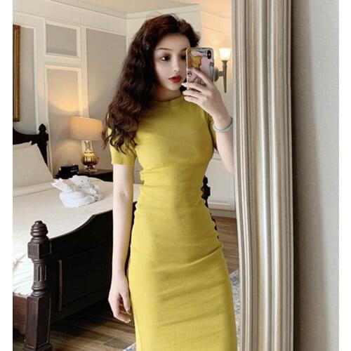 Retro dress female 2021 winter new self-cultivation wild mid-length dress short-sleeved bag hip A-line short dress