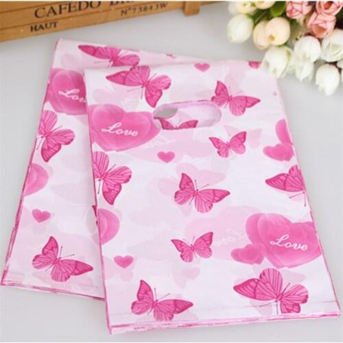 New Design Wholesale 100pcs/lot 15*20cm Hot Pink Love Butterfly Plastic Shopping Packaging Bags Party Favor Bags