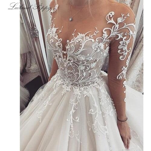 Lceland Poppy A-line Sexy Wedding Dresses 2020 Illusion Neck Lace Appliques Full Sleeves Floor Length Tulle Bridal Gowns