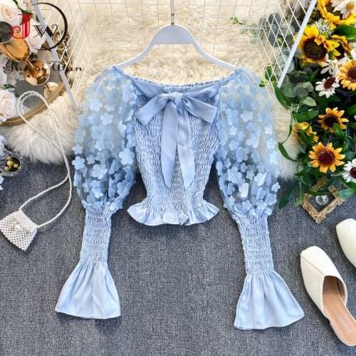 Junxi Wan Short Sleeve Blouses