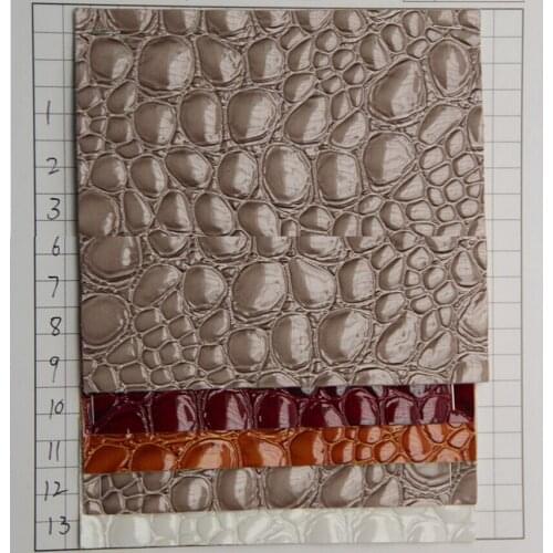 Wholesale Crystal stone pattern synthetic PU leather fabric raw material for Bags, gloves, shoes, belts, home, furniture