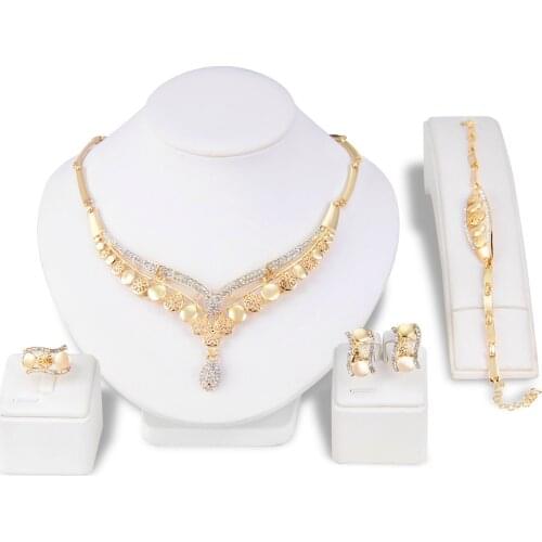 Four-piece golden bridal jewellery set, wedding suit, necklace, earring, bracelet, ring