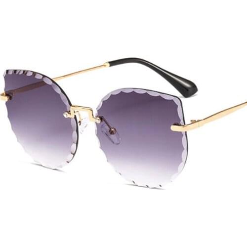 New Fashion Rimless Sunglasses Ladies Cat Eye Marine Lens Sun Glasses Frameless Trimming Women Sunglass UV400 0533
