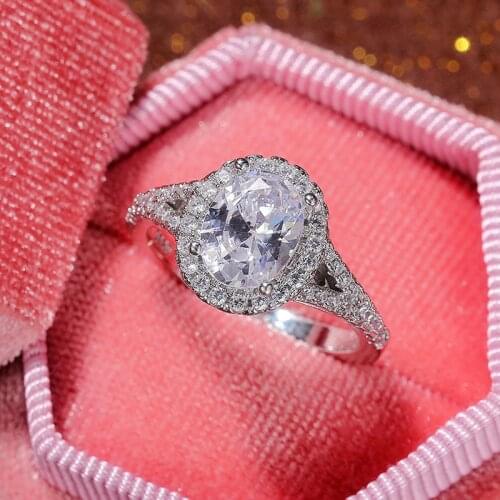 YSDLJG Elegant Women Wedding Bands Ring White Oval Shiny CZ Stone Anniversary Party Engagement Rings for Women Jewelry Gifts