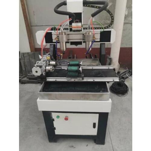 Song li CE certified multifunctional small 4060 CNC engraving machine 2.2KW double rotating shaft