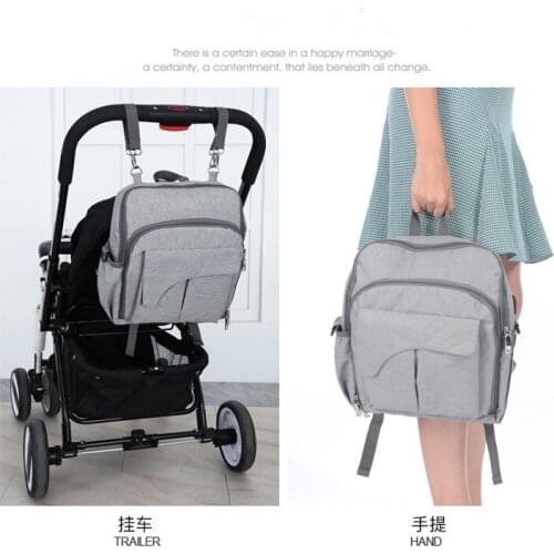 Fashion Mummy Maternity Nappy Bag Seat fixing Safety seats baby care nappy changing bag big for stroller