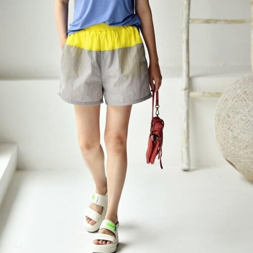 MICOCO K1088C Korean version of fashion color contrast design comfortable elastic waist loose casual sports shorts