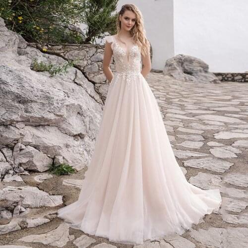 Elegant V-Neck Wedding Dresses 2021 Cap Sleeve Appliques Sleeveless A-Line Tulle Bridal Gown Lace-Up Backless Sweep Train