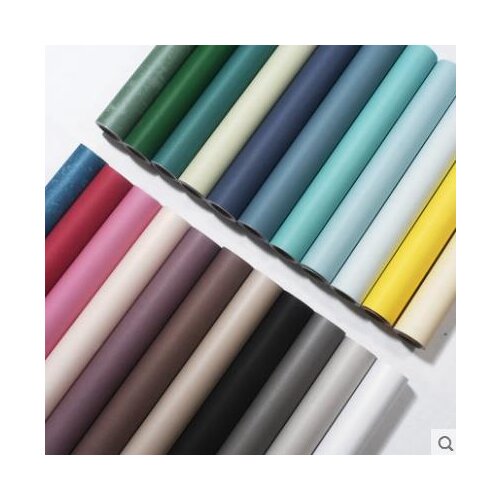Non-woven wallpaper simple solid color warm dormitory clothing store bedroom living room TV background wallpaper