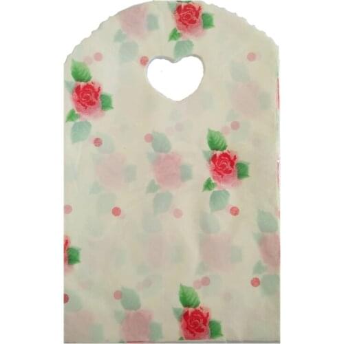 Hot Sale 50pcs Rose Design Beige Plastic Bags 13x21cm Small Candy Gifts Jewelry Packaging Bags Plastic Gift Bag With Handle